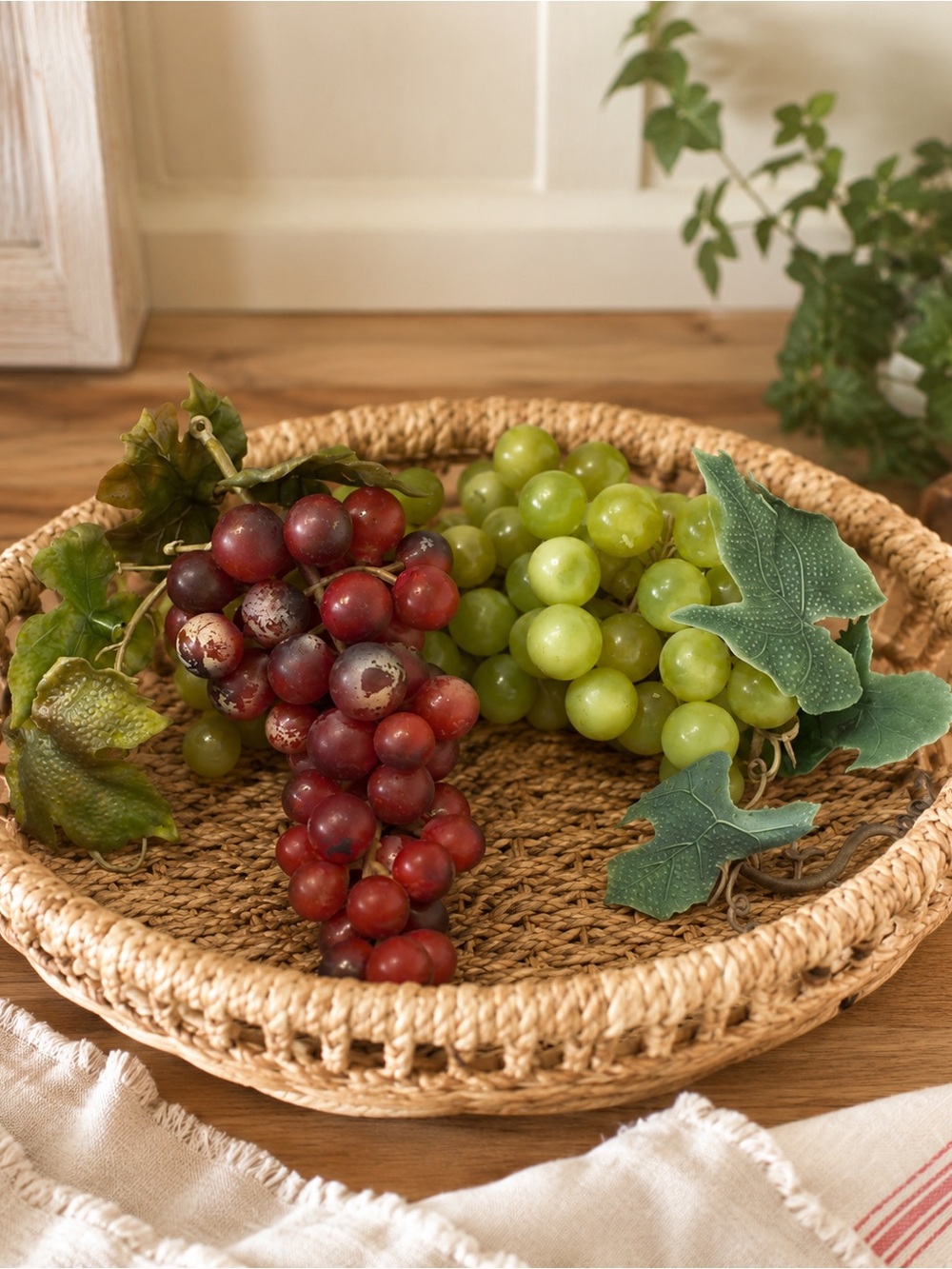 Source Unknown Red and Green Faux Grapes on Woven Tray